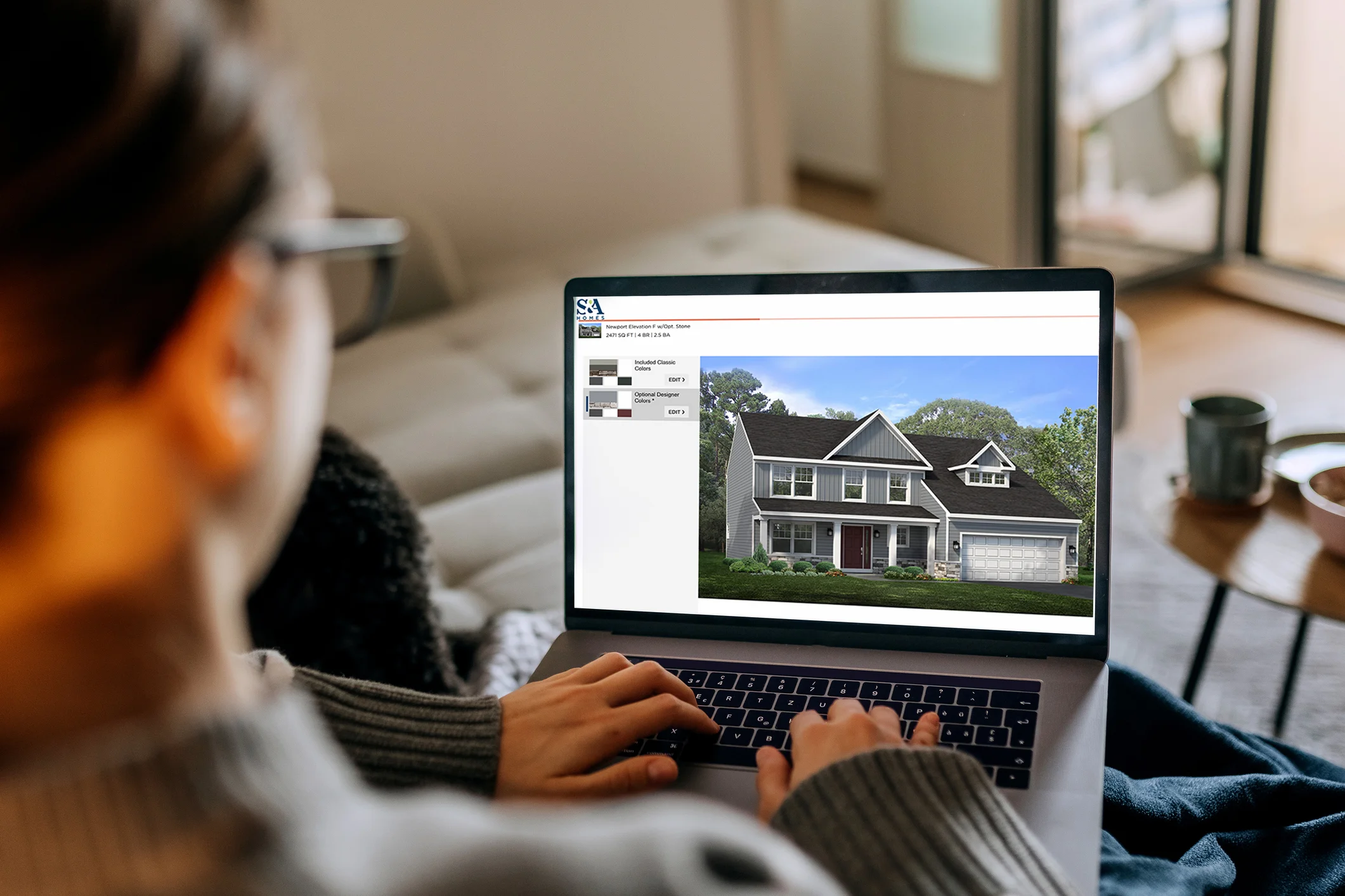 User on a laptop using S&A Exterior Visualizer tool